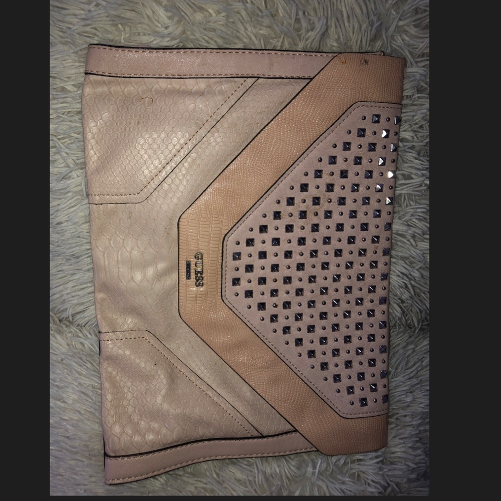 Baby pink Spike designed GUESS clutch